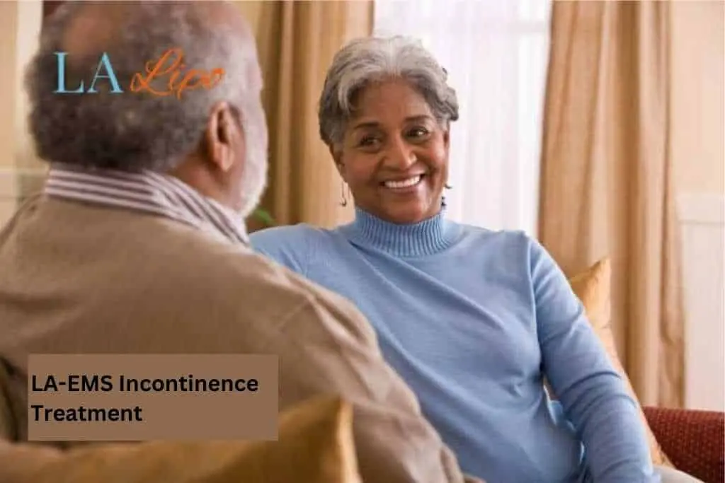 Couple sat smiling at each other - LA-EMS treatment Loughborough