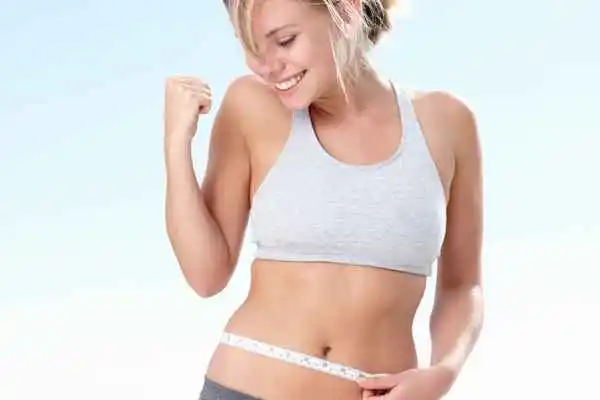 woman happy after fat reduction treatment Loughborough