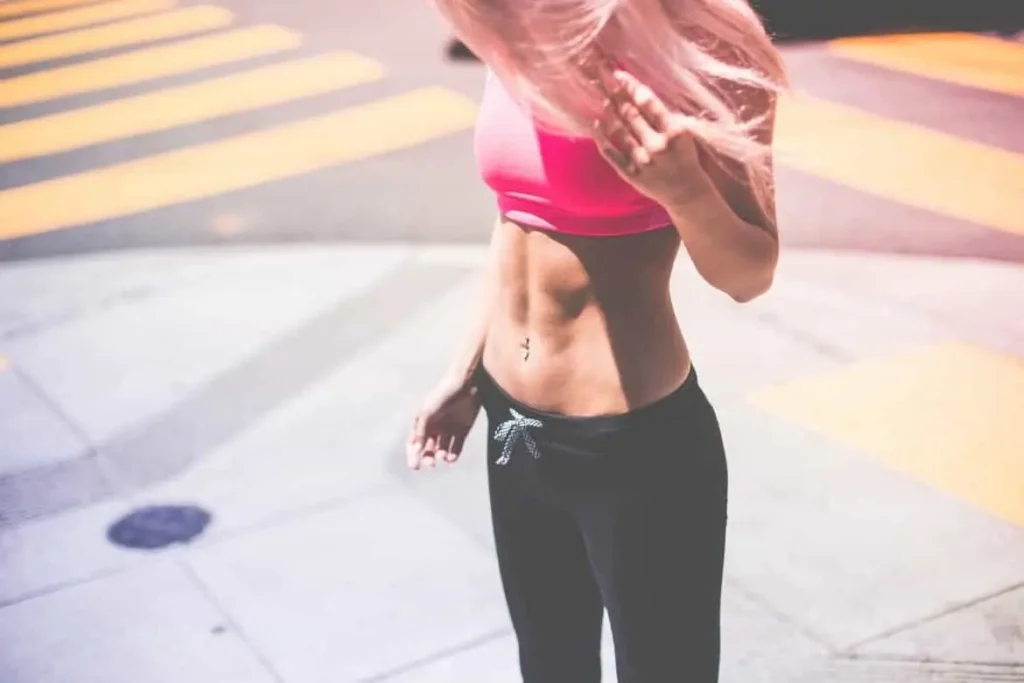 Woman with toned stomach after LA-EMS Body Sculpting Treatment Loughborough