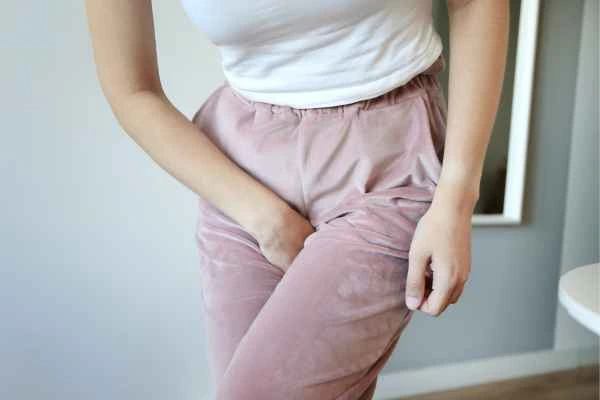 woman running for the toilet because of urinary incontinence Loughborough